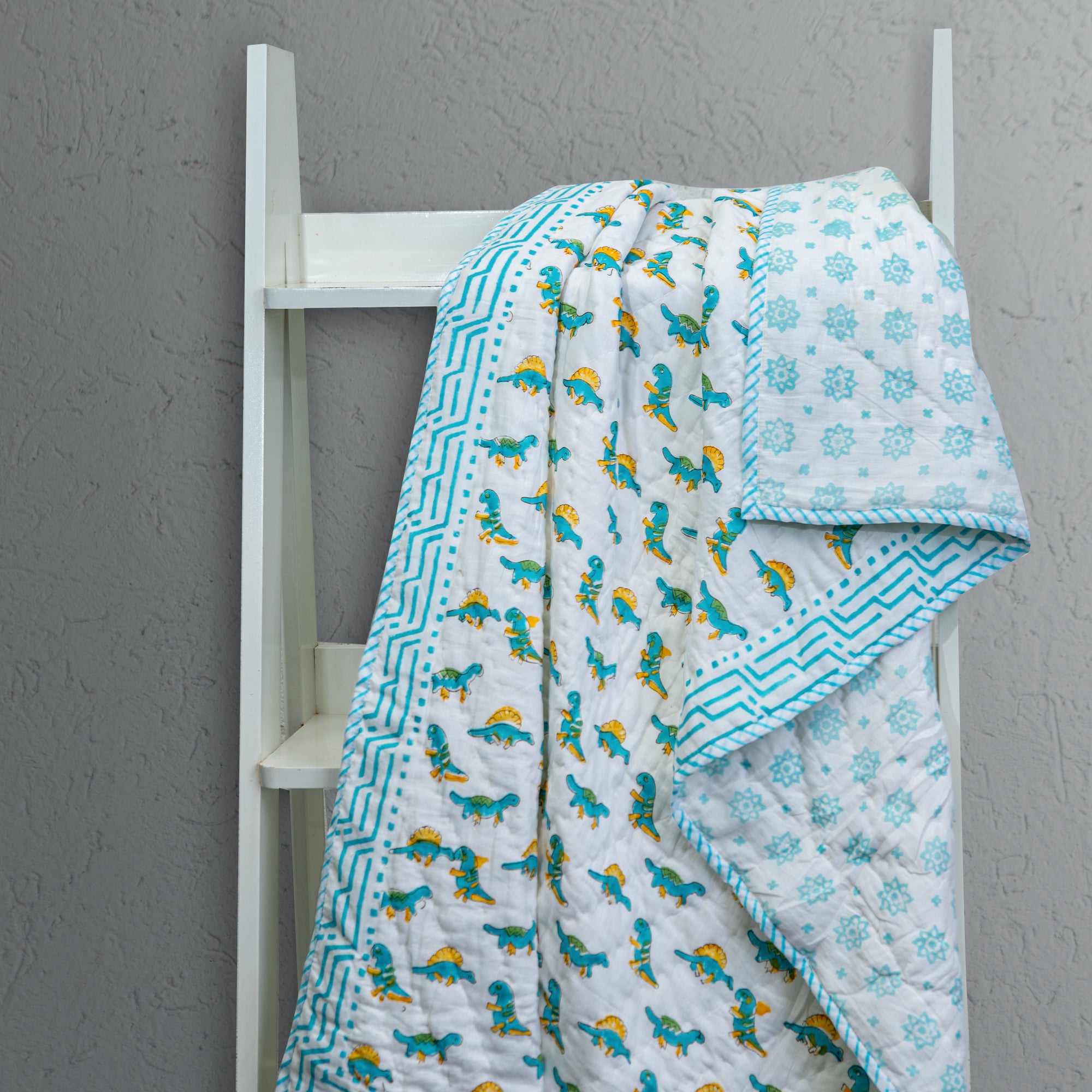 Dino Dash Muslin Baby Quilt