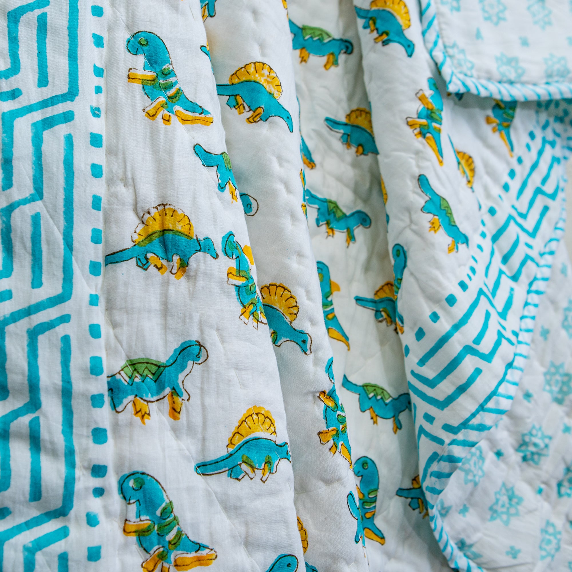 Dino Dash Muslin Baby Quilt